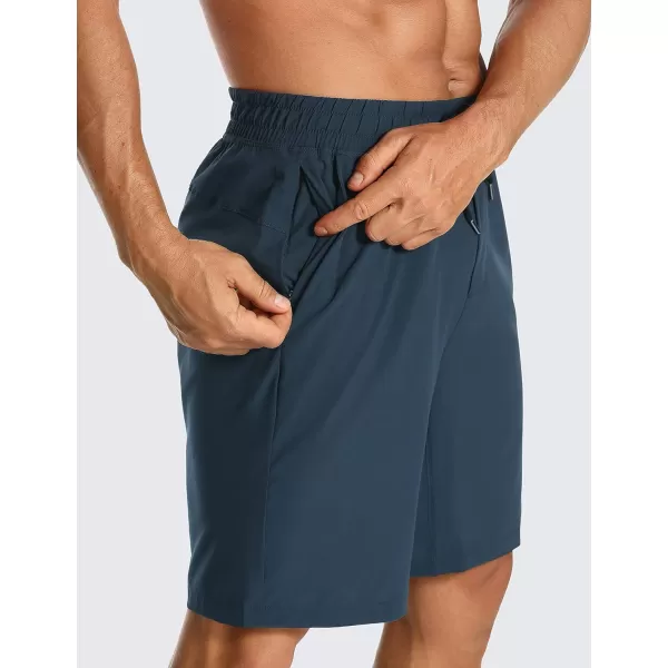 CRZ YOGA Mens Linerless Workout Shorts  7  9 Quick Dry Running Sports Athletic Gym Shorts with Pockets7 inches Stelindigo