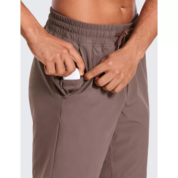 CRZ YOGA Mens Linerless Workout Shorts  7  9 Quick Dry Running Sports Athletic Gym Shorts with Pockets9 inches Brown Rock