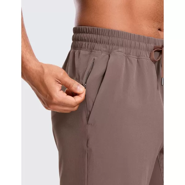 CRZ YOGA Mens Linerless Workout Shorts  7  9 Quick Dry Running Sports Athletic Gym Shorts with Pockets9 inches Brown Rock