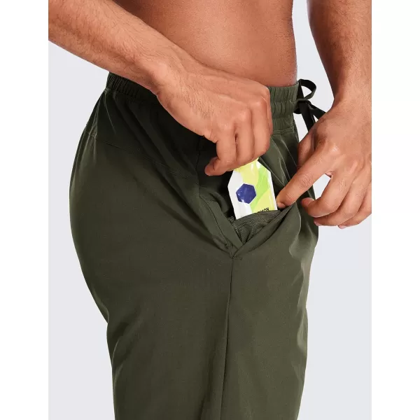 CRZ YOGA Mens Linerless Workout Shorts  7  9 Quick Dry Running Sports Athletic Gym Shorts with Pockets9 inches Dark Olive