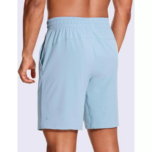 CRZ YOGA Mens Linerless Workout Shorts  7  9 Quick Dry Running Sports Athletic Gym Shorts with Pockets9 inches Light Grayish Blue