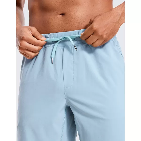 CRZ YOGA Mens Linerless Workout Shorts  7  9 Quick Dry Running Sports Athletic Gym Shorts with Pockets9 inches Light Grayish Blue