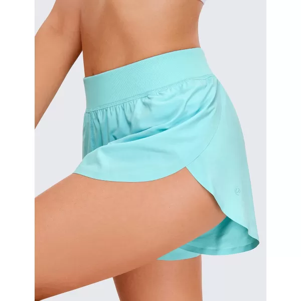 CRZ YOGA Mid Waisted Dolphin Athletic Running Shorts for Women Lightweight High Split Gym Workout Shorts with Liner Quick DryTurquoise