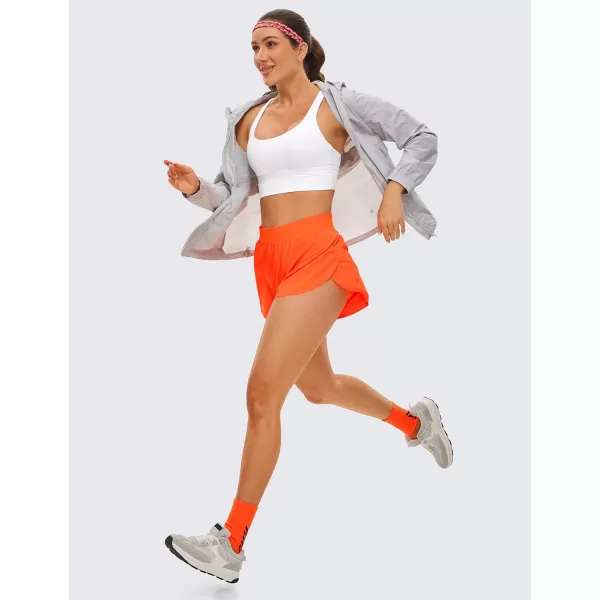 CRZ YOGA Mid Waisted Dolphin Athletic Shorts for Women Lightweight High Split Gym Workout Shorts with Liner Quick DryNeon Orange