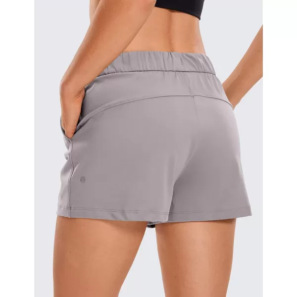 CRZ YOGA Stretch Shorts for Women Casual Work  Athletic Shorts with Pockets Travel Workout Hiking Golf Running Shorts25 inches Dark Chrome