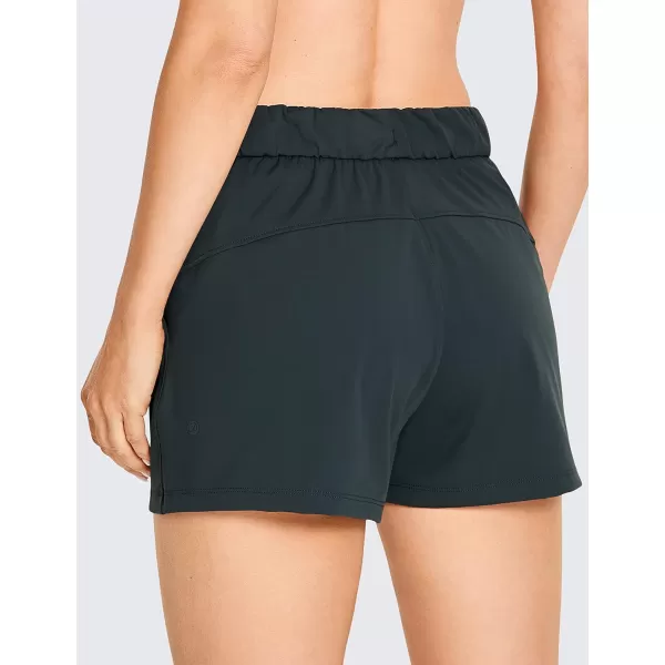 CRZ YOGA Stretch Shorts for Women Casual Work  Athletic Shorts with Pockets Travel Workout Hiking Golf Running Shorts25 inches Melanite