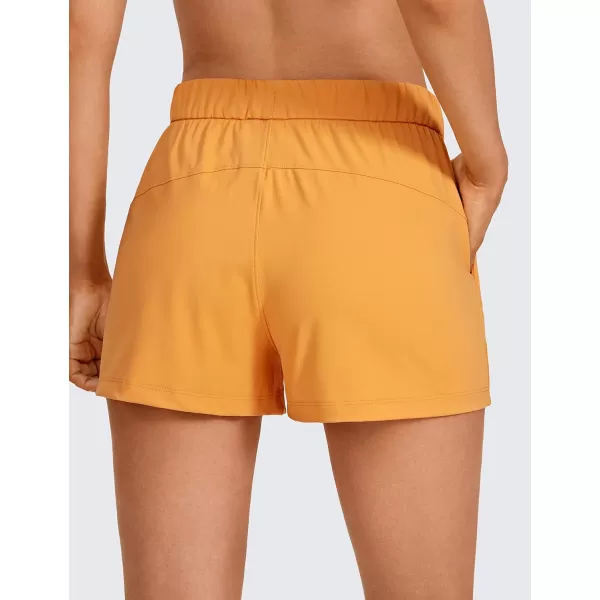 CRZ YOGA Stretch Shorts for Women Casual Work  Athletic Shorts with Pockets Travel Workout Hiking Golf Running Shorts25 inches Primulin