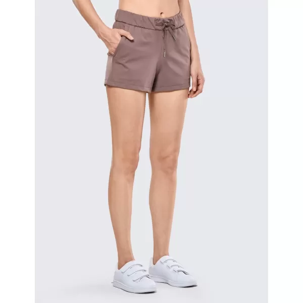 CRZ YOGA Stretch Shorts for Women Casual Work  Athletic Shorts with Pockets Travel Workout Hiking Golf Running ShortsRegular Fit Antique Bark25