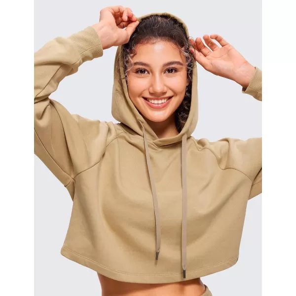 CRZ YOGA Womens Casual Cropped Hoodie Long Sleeves Drawstring Sweatshirts Cute Pullover Workout Crop TopsCalifornia Sand