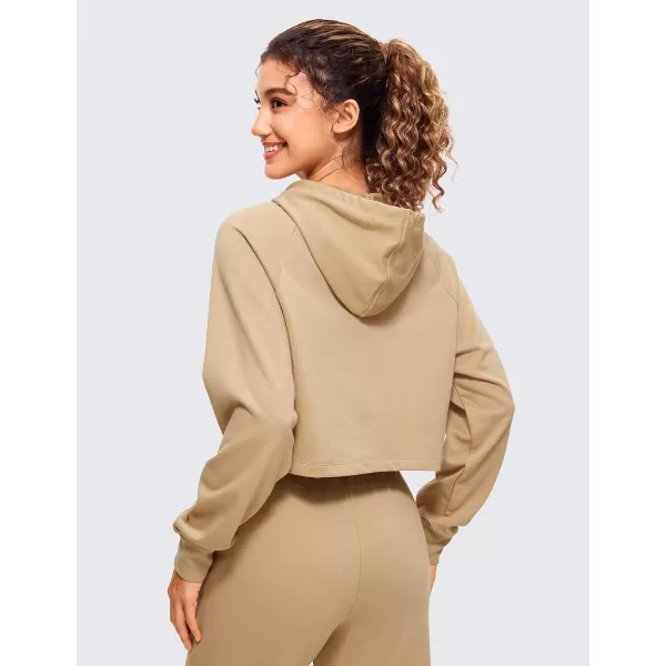 CRZ YOGA Womens Casual Cropped Hoodie Long Sleeves Drawstring Sweatshirts Cute Pullover Workout Crop TopsCalifornia Sand