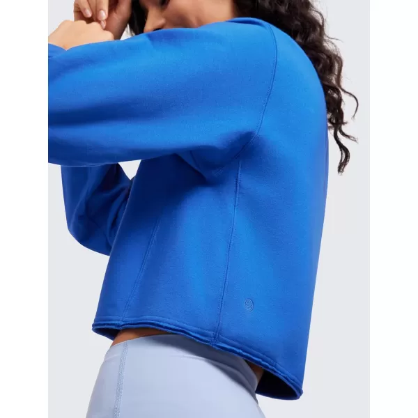 CRZ YOGA Womens Fleece Cropped Sweatshirts Crewneck Long Sleeve Sweat Shirts Double Raw Hem Workout Casual Pullover TopsSparkle Blue