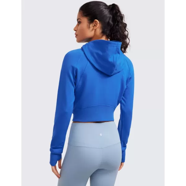 CRZ YOGA Womens Fleece Zip Up Cropped Hoodie Workout Jacket Athletic Casual Long Sleeve Sweatshirts with Thumb HolesSparkle Blue