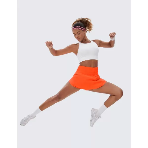 CRZ YOGA Womens High Waisted Flowy Athletic Shorts Ruffle Skirt Wrap Front Liner Workout Running Shorts with Zip PocketNeon Orange