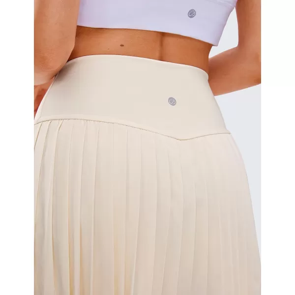 CRZ YOGA Womens High Waisted Pleated Tennis Skirts with Pockets Tummy Control Casual Liner Skorts A Line Workout Golf SkirtsWhite Apricot