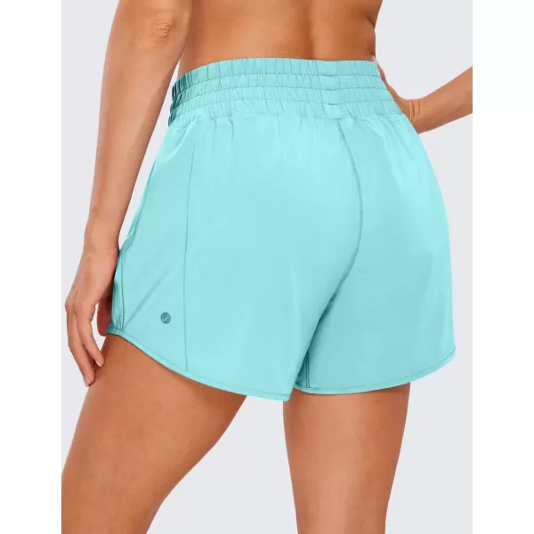 CRZ YOGA Womens High Waisted Running Shorts 4  Mesh Liner Lightweight Gym Sport Athletic Workout Shorts with Zipper PocketLiner Turquoise