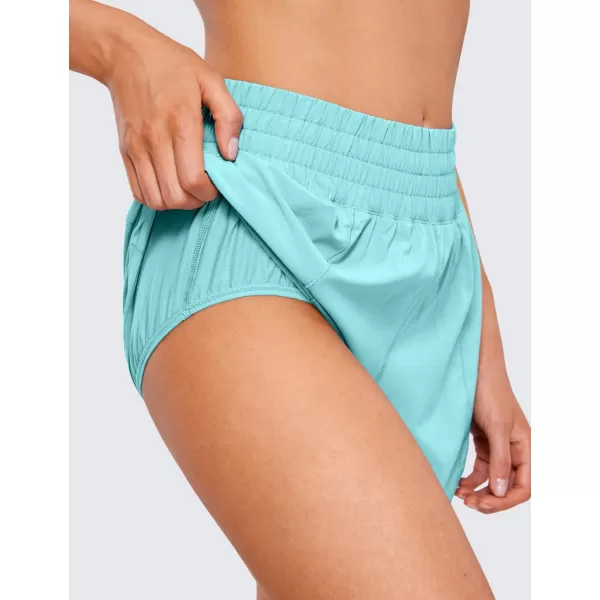 CRZ YOGA Womens High Waisted Running Shorts 4  Mesh Liner Lightweight Gym Sport Athletic Workout Shorts with Zipper PocketLiner Turquoise