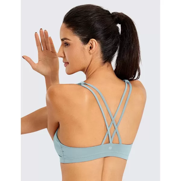 CRZ YOGA Womens Low Impact Strappy Sports Bra  Low Cut Wirefree Padded Yoga Bra Criss Cross BackLight Grayish Blue