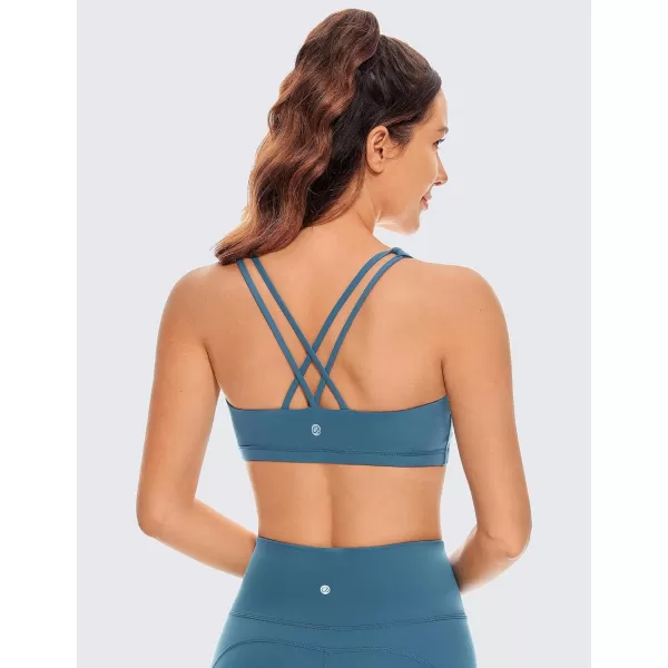 CRZ YOGA Womens Low Impact Strappy Sports Bra  Low Cut Wirefree Padded Yoga Bra Criss Cross BackPetrol Blue