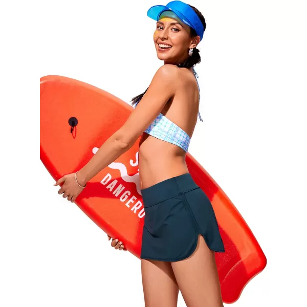 CRZ YOGA Womens Mid Rise Swim Skirt Athletic Bathing Suit Skorts Skirts Side Split Swimsuit Bottoms with PocketInsignia Blue