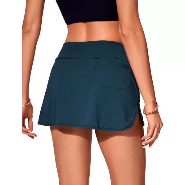 CRZ YOGA Womens Mid Rise Swim Skirt Athletic Bathing Suit Skorts Skirts Side Split Swimsuit Bottoms with PocketInsignia Blue