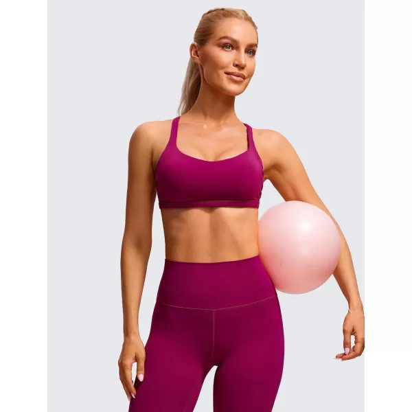 CRZ YOGA Womens Strappy Sports Bra  Criss Cross Back Padded Medium Support Wireless Bra Sexy Workout Yoga BraMagenta Purple