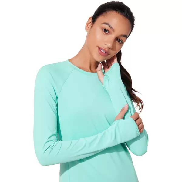 CRZ YOGA Womens UPF 50 Sun Protection Long Sleeve Workout Shirts Quick Dry Outdoor Hiking Running Tops with Thumb HolesTropical Mint Green