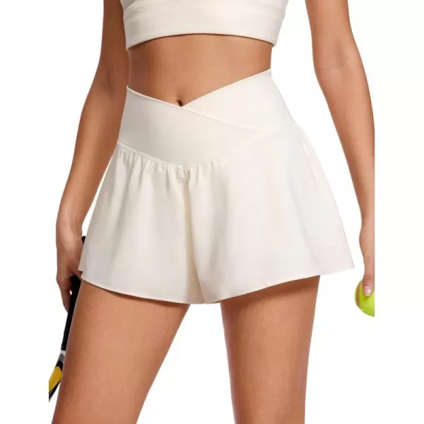 CRZ YOGA Crossover Butterfly Athletic Shorts for Women 2 in 1 Flowy High Waisted Tennis Running Workout Shorts PocketsWhite Apricot