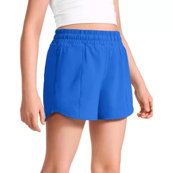 CRZ YOGA Girls Athletic Shorts with Zipper Pocket Lightweight Running Shorts for Teen Girls Kids LinerSparkle Blue