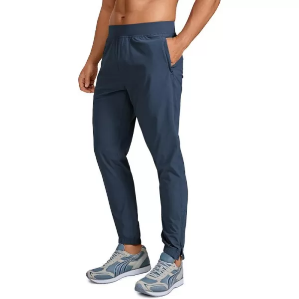 CRZ YOGA Mens Lightweight Joggers Pants  29 Quick Dry Workout Pants Track Running Gym Athletic Pants with Zipper PocketsElectric Blue