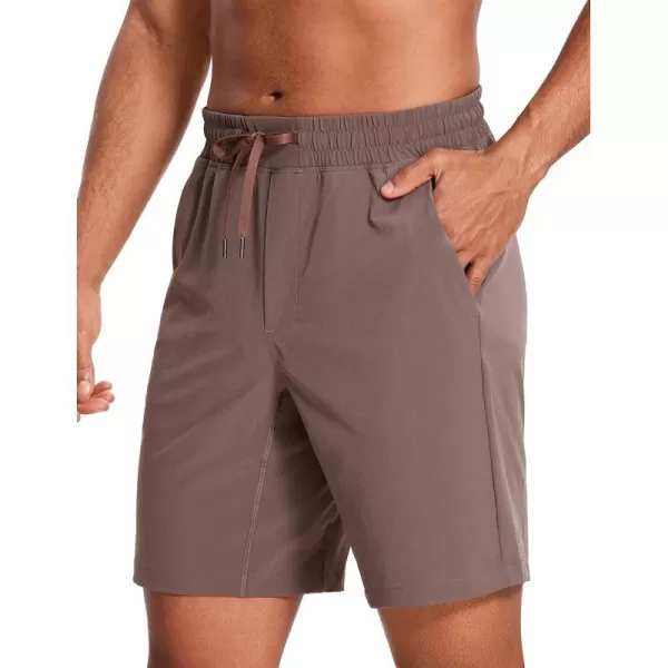 CRZ YOGA Mens Linerless Workout Shorts  7  9 Quick Dry Running Sports Athletic Gym Shorts with Pockets9 inches Brown Rock