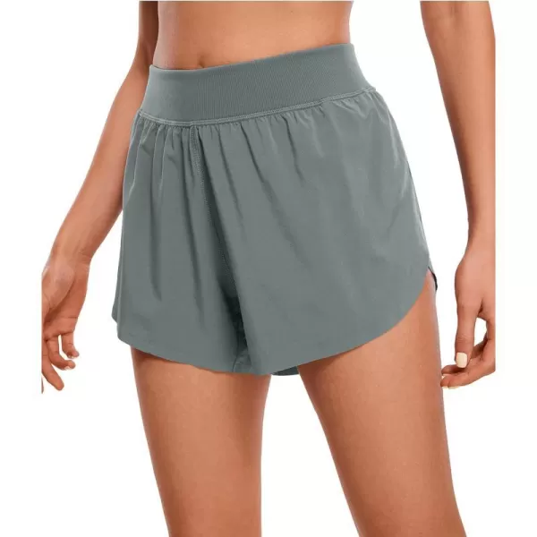 CRZ YOGA Mid Waisted Dolphin Athletic Running Shorts for Women Lightweight High Split Gym Workout Shorts with Liner Quick DryGrey Sage