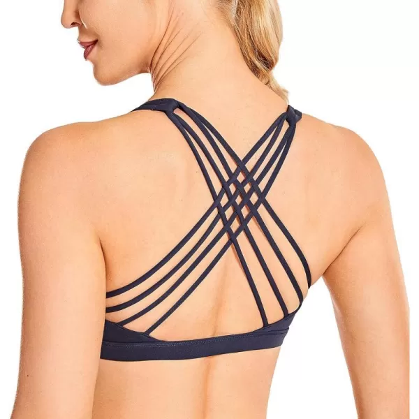 CRZ YOGA Strappy Sports Bras for Women  Criss Cross Back Sexy Wireless Padded Yoga Bra Cute WorkoutNavy