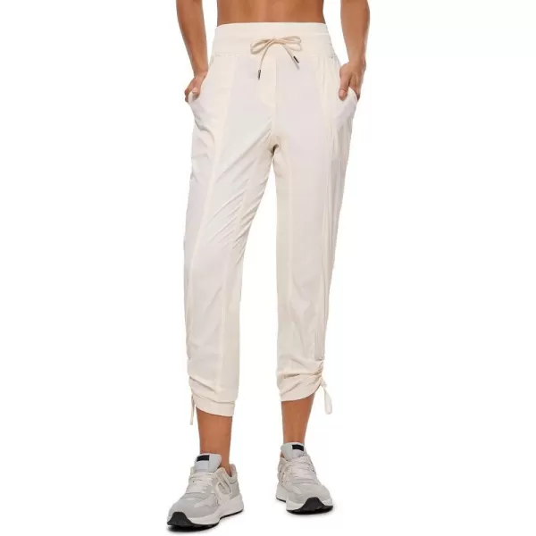 CRZ YOGA Womens Casual 78 Pants 2527  Lightweight Workout Outdoor Athletic Track Travel Lounge Joggers Pockets27 Inseam White Apricot