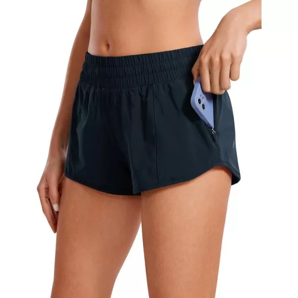 CRZ YOGA Womens Running Shorts Low Waisted 25  Mesh Liner Quick Dry Track Gym Athletic Workout Shorts with Zip PocketTrue Navy