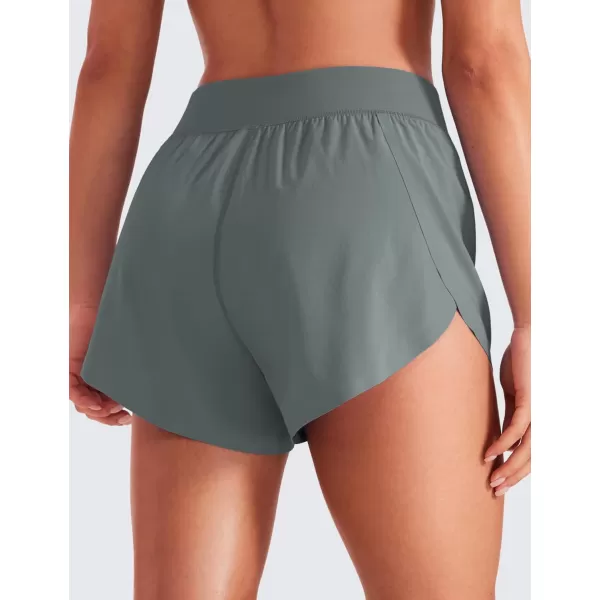 CRZ YOGA Mid Waisted Dolphin Athletic Shorts for Women 4quot Lightweight High Split Gym Workout Shorts with Liner Quick DryGrey Sage