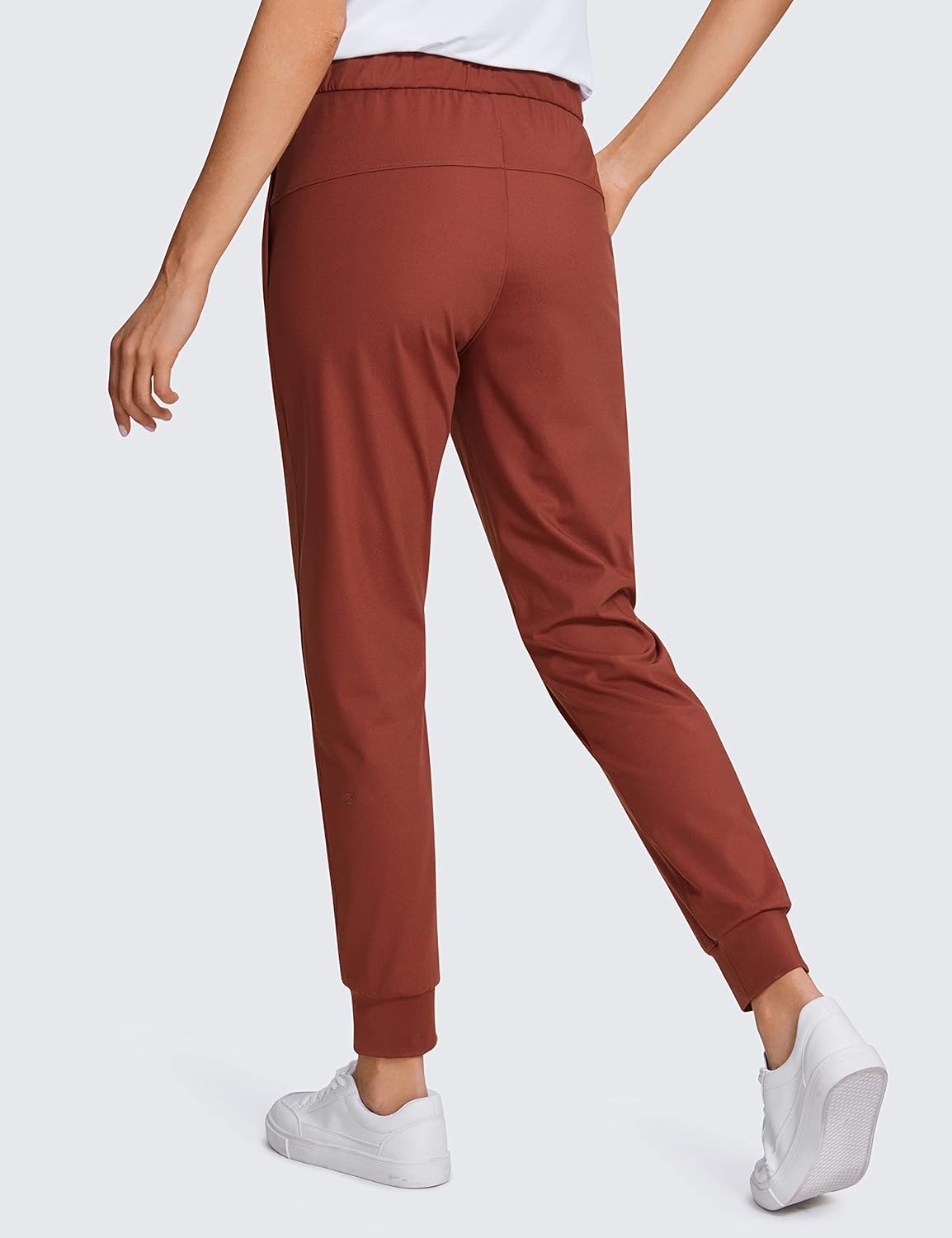 CRZ YOGA 4Way Stretch Workout Joggers for Women 28quot  Casual Travel Pants Lounge Athletic Joggers with PocketsThe Cognac Brown