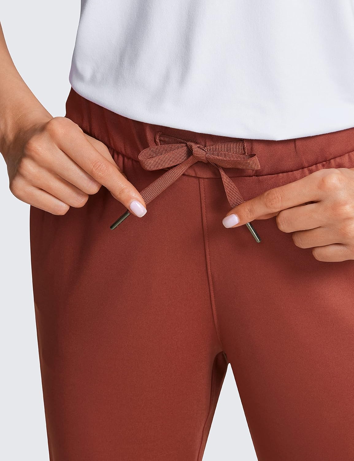 CRZ YOGA 4Way Stretch Workout Joggers for Women 28quot  Casual Travel Pants Lounge Athletic Joggers with PocketsThe Cognac Brown