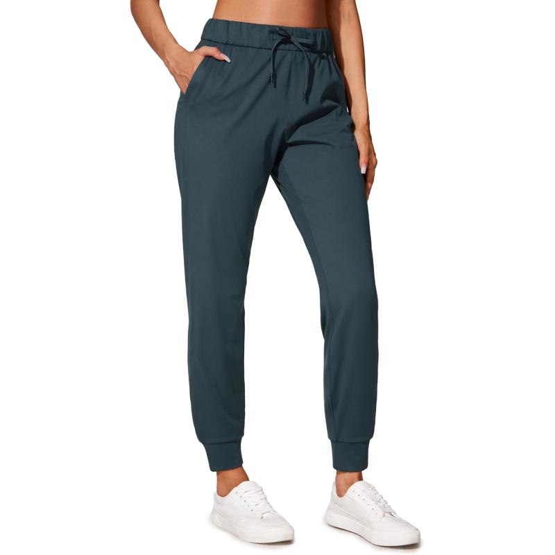 CRZ YOGA 4Way Stretch Workout Joggers for Women 28quot  Casual Travel Pants Lounge Athletic Joggers with PocketsForest Dark Green