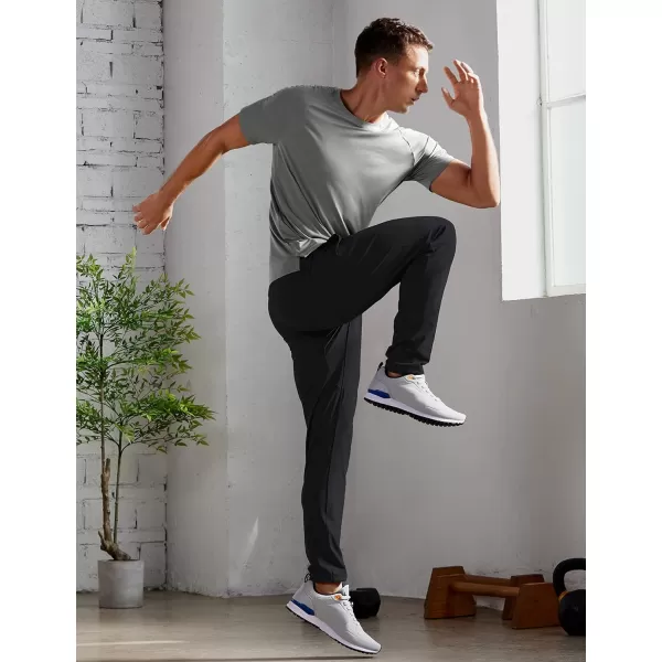 CRZ YOGA 4Way Stretch Athletic Pants for Men 30quot Workout Lounge Casual Work Jogger Pants with Zip PocketBlack