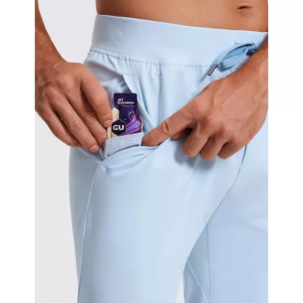 CRZ YOGA 4Way Stretch Athletic Pants for Men 30quot Workout Lounge Casual Work Jogger Pants with Zip PocketChambray Blue