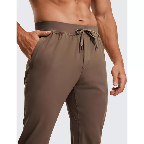 CRZ YOGA 4Way Stretch Athletic Pants for Men 30quot Workout Lounge Casual Work Jogger Pants with Zip PocketDark Olive Brown