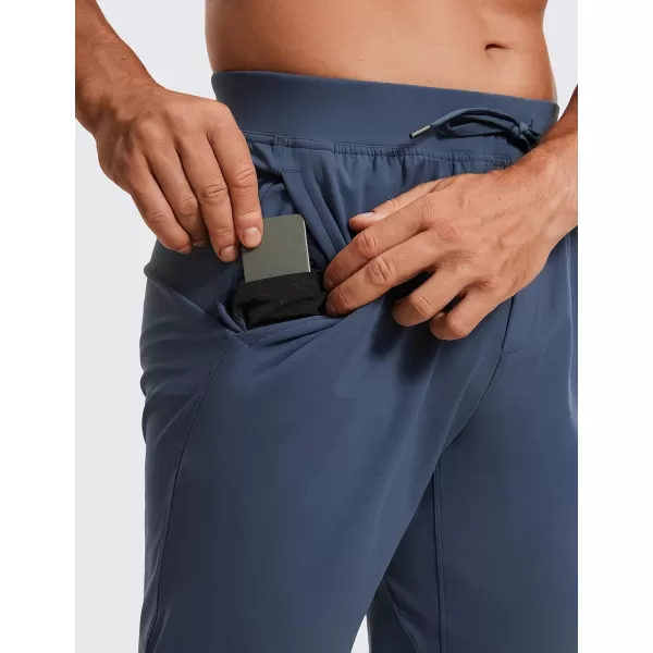 CRZ YOGA 4Way Stretch Athletic Pants for Men 30quot Workout Lounge Casual Work Jogger Pants with Zip PocketElectric Blue