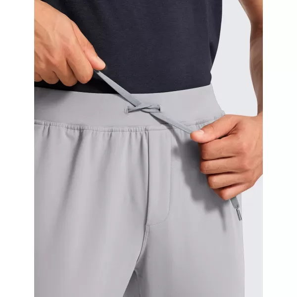 CRZ YOGA 4Way Stretch Athletic Pants for Men 30quot Workout Lounge Casual Work Jogger Pants with Zip PocketGull Gray