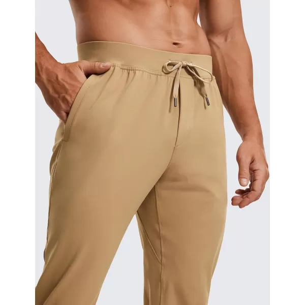 CRZ YOGA 4Way Stretch Athletic Pants for Men 30quot Workout Lounge Casual Work Jogger Pants with Zip PocketKhaki Sand