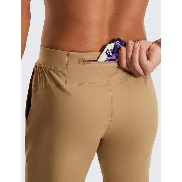 CRZ YOGA 4Way Stretch Athletic Pants for Men 30quot Workout Lounge Casual Work Jogger Pants with Zip PocketKhaki Sand
