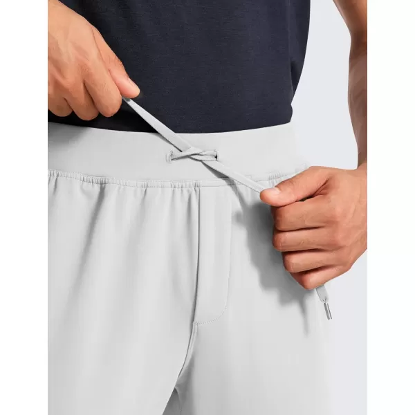 CRZ YOGA 4Way Stretch Athletic Pants for Men 30quot Workout Lounge Casual Work Jogger Pants with Zip PocketPlatinum Grey