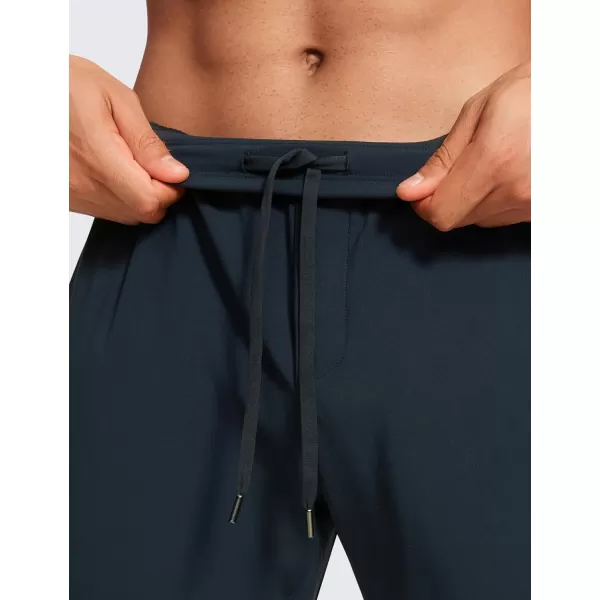 CRZ YOGA 4Way Stretch Athletic Pants for Men 30quot Workout Lounge Casual Work Jogger Pants with Zip PocketTrue Navy