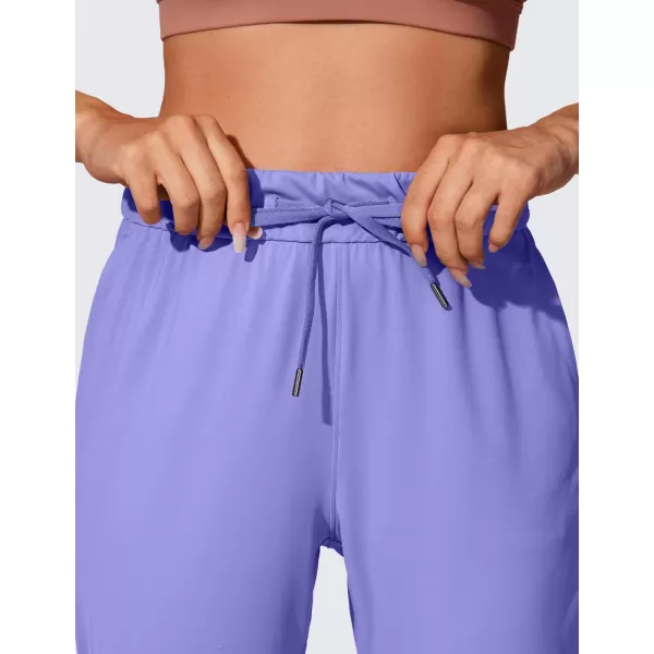 CRZ YOGA 4Way Stretch Workout Joggers for Women 28quot  Casual Travel Pants Lounge Athletic Joggers with PocketsDark Lavender Purple