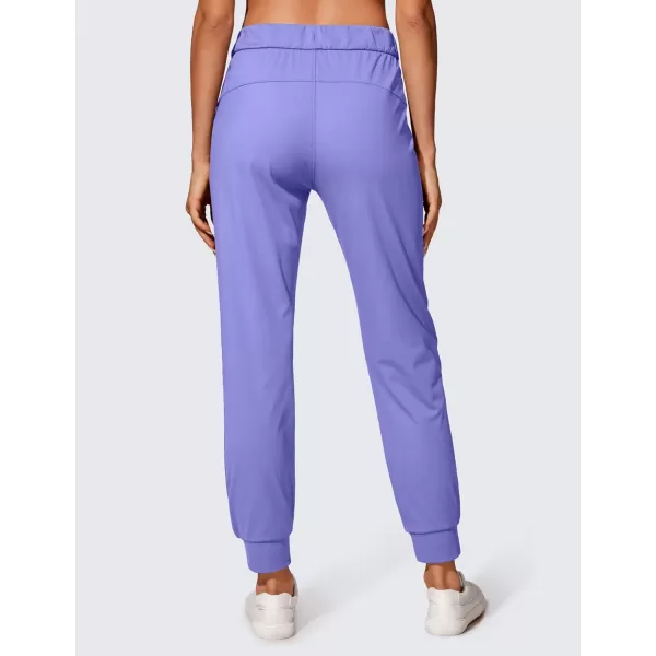 CRZ YOGA 4Way Stretch Workout Joggers for Women 28quot  Casual Travel Pants Lounge Athletic Joggers with PocketsDark Lavender Purple