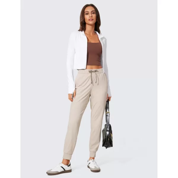 CRZ YOGA 4Way Stretch Workout Joggers for Women 28quot  Casual Travel Pants Lounge Athletic Joggers with PocketsMojave Tan